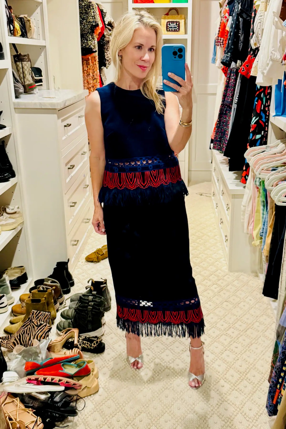 The Rivington Skirt is a midi in embroidered fringe wool, a clean finished waist and back zipper