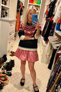 The Kinsley Skirt is our red and white gingham mini with a trim traced fitted waist.