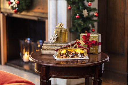 Front view of Christmas Toys Memory Nativity in Multi showcasing hand-painted Holy Family beneath a star-topped arch
