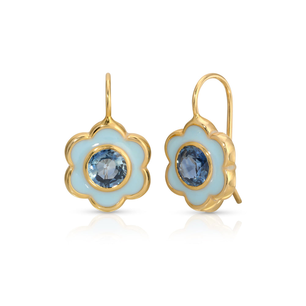 Front view of Enamel Flower Earrings with pale blue petals, blue center stones and gold-plated setting on white background