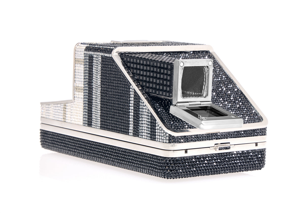 Angled front view of Image Elsa crystal-adorned rectangular clutch with open mirror compartment and silver hardware on white