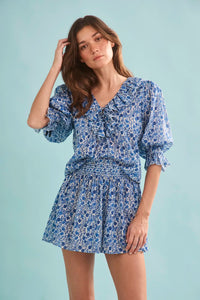 The Imogen Blouse in Bermuda Blooms paired with matching Jemma Shorts. 