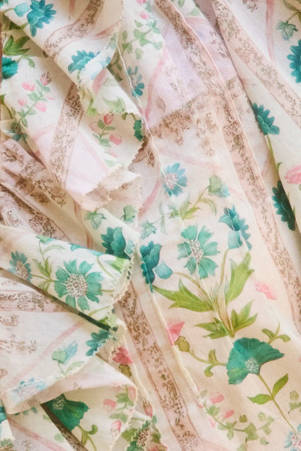 Close up of the Imogen Blouse, cotton voile ruffle blouse, in Pink Trellis.