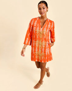 Ines Caftan Mini Dress in Hibiscus Mosaic linen with embroidered palm details, djellaba collar, and relaxed caftan silhouette.