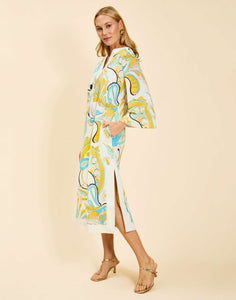 Ines Midi Caftan in Marble Rhapsody with Djellaba-style neckline, relaxed sleeves, side slits, and functional hand pockets.