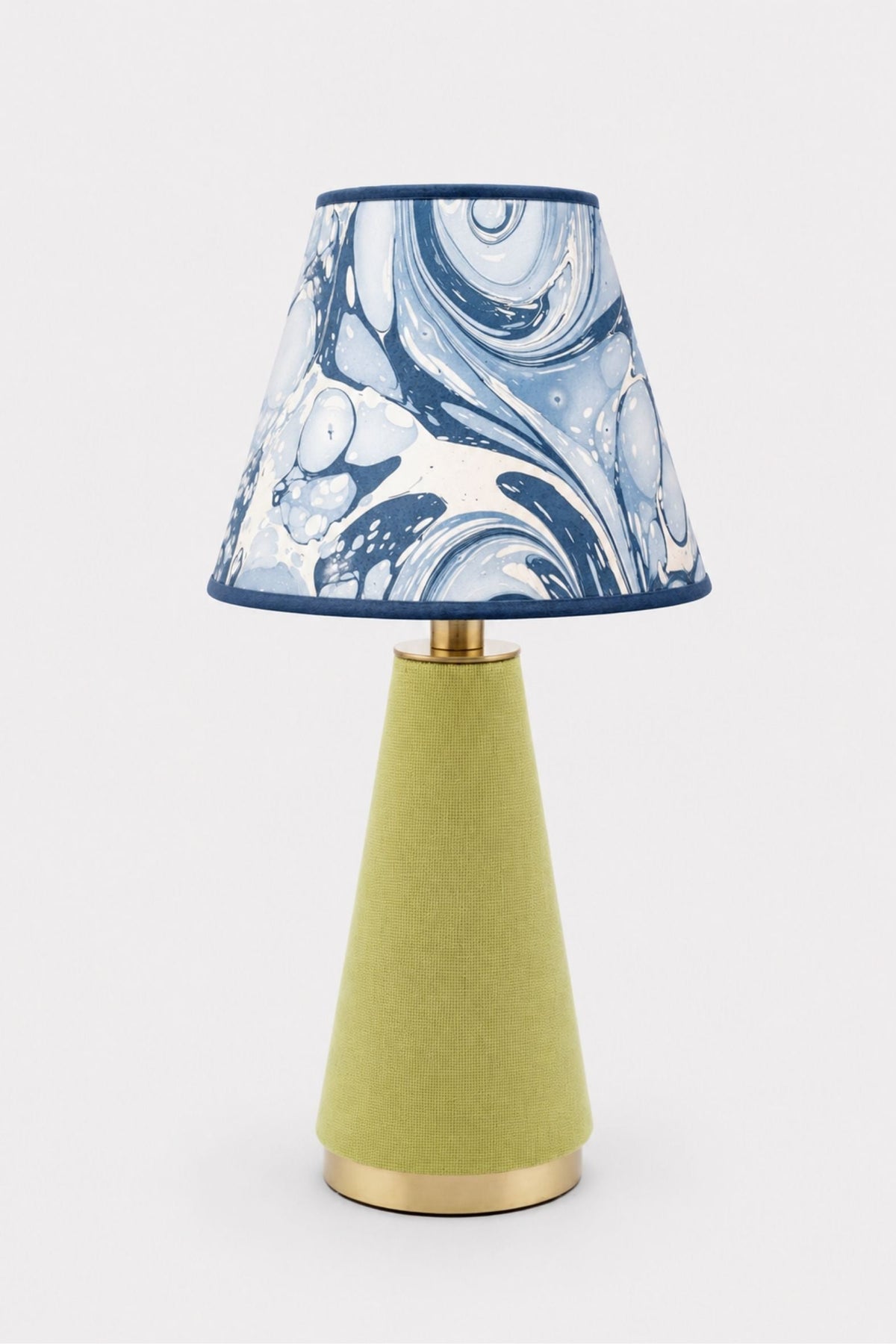 Inner Child hand-marbled empire lampshade with ocean wave pattern in blue-white swirls; green fabric base