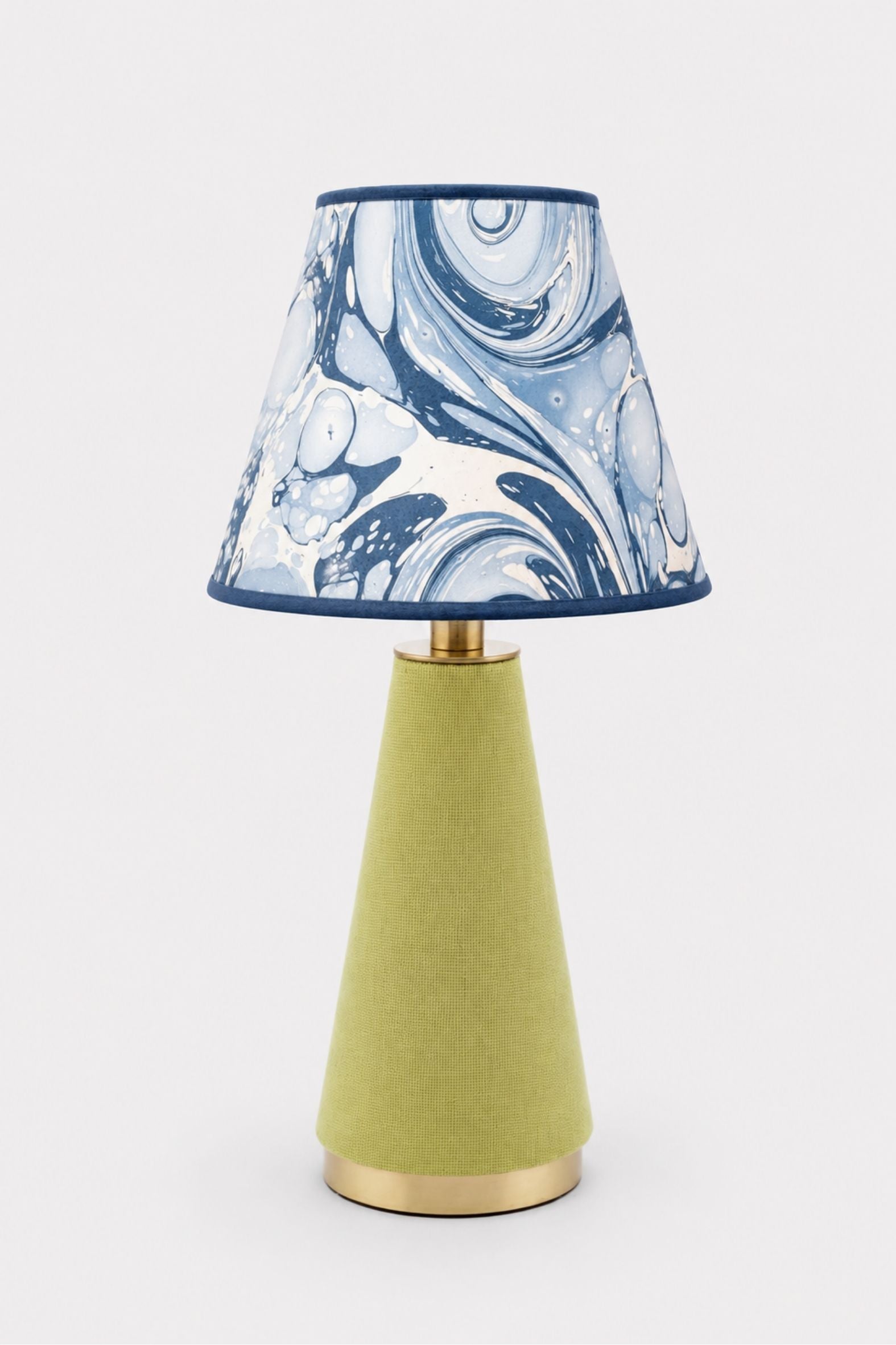 Inner Child hand-marbled empire lampshade with ocean wave pattern in blue-white swirls; green fabric base