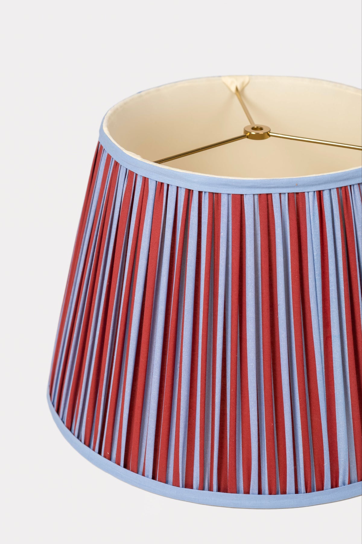 Close-up of 16" pleated empire lampshade showing red and blue vertical stripes - Inner Child