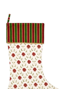 Blockprint stocking with red shell pattern and green vine accents, red-green striped cuff close-up - Inner Child holiday collection