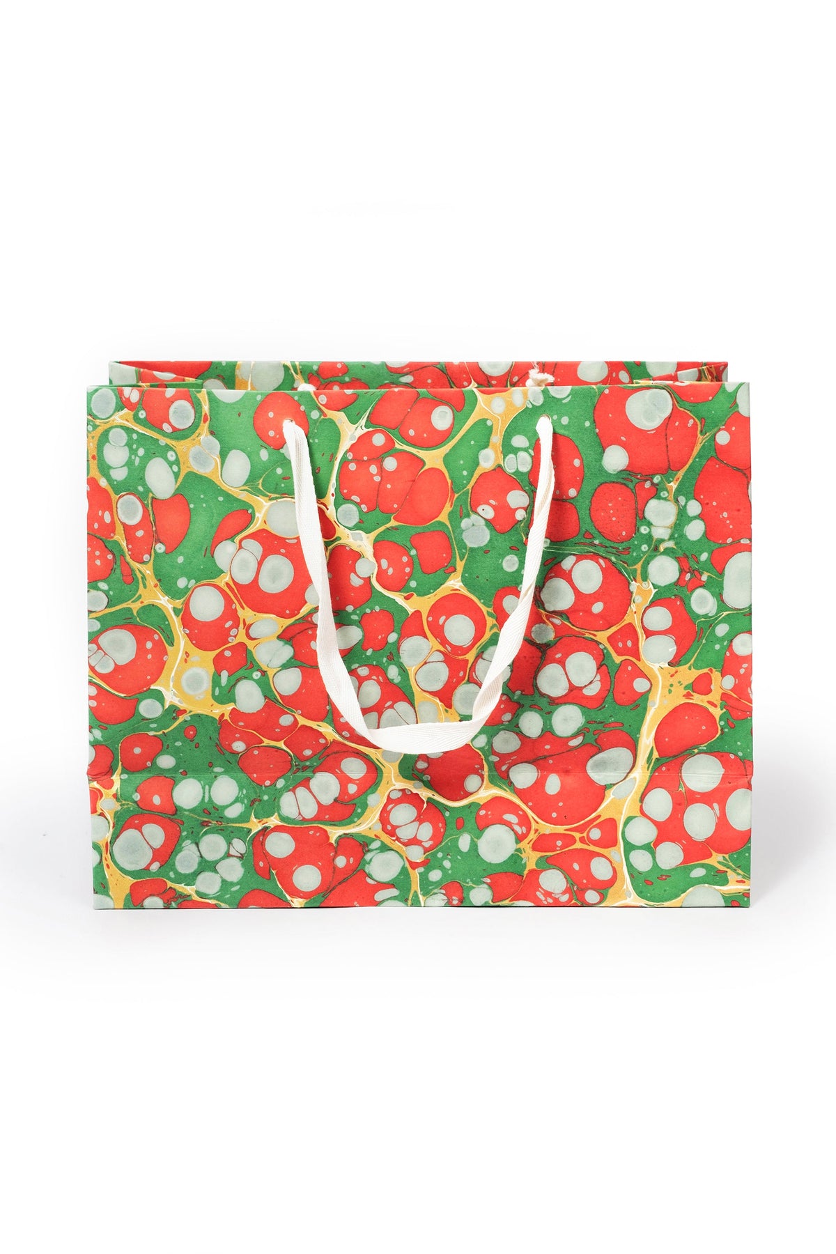 Large Christmas Gems hand-marbled gift bag in red, green, white, and gold with white handles, front view.