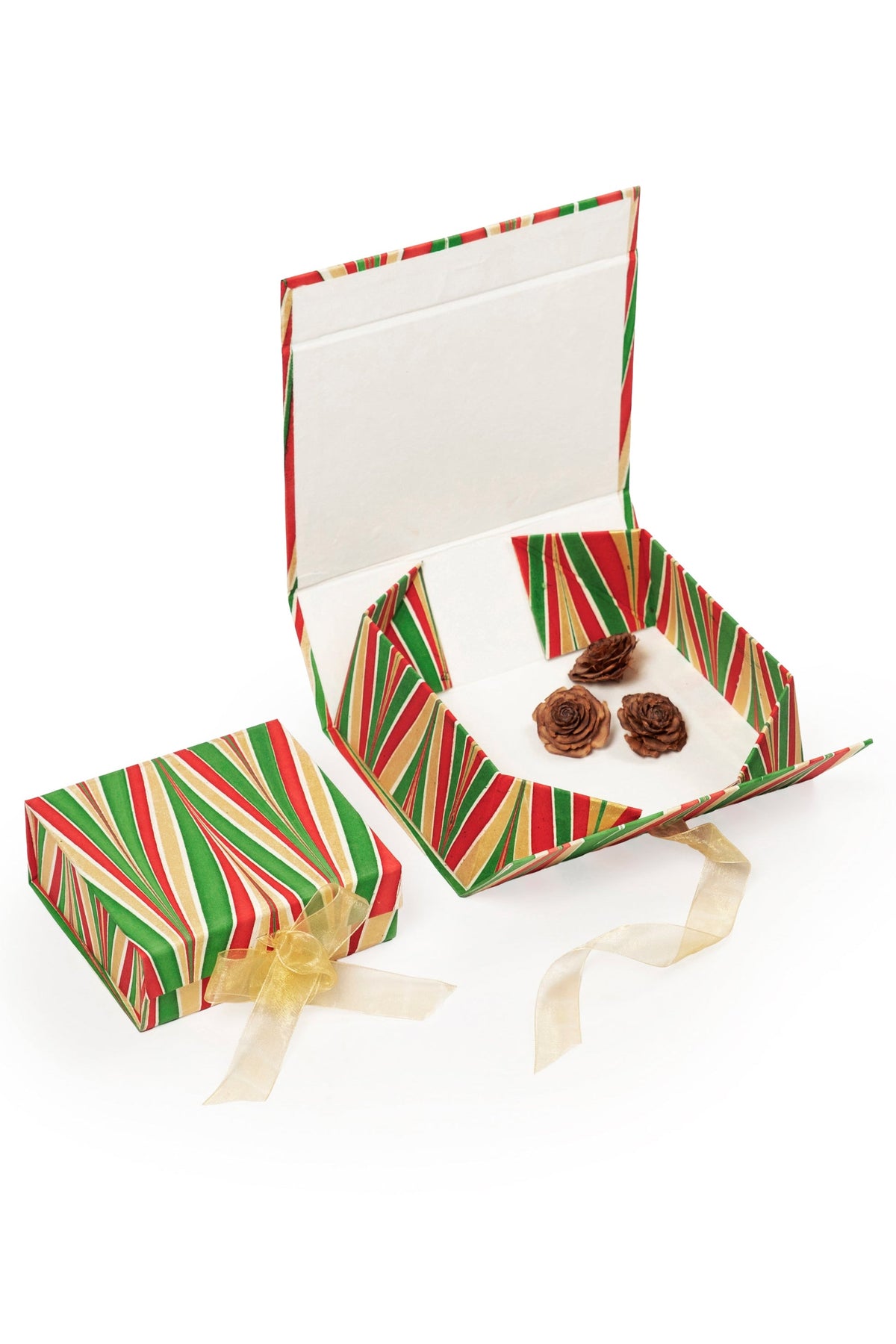 Inner Child hand-marbled collapsible holiday keepsake box open with pine cone decor