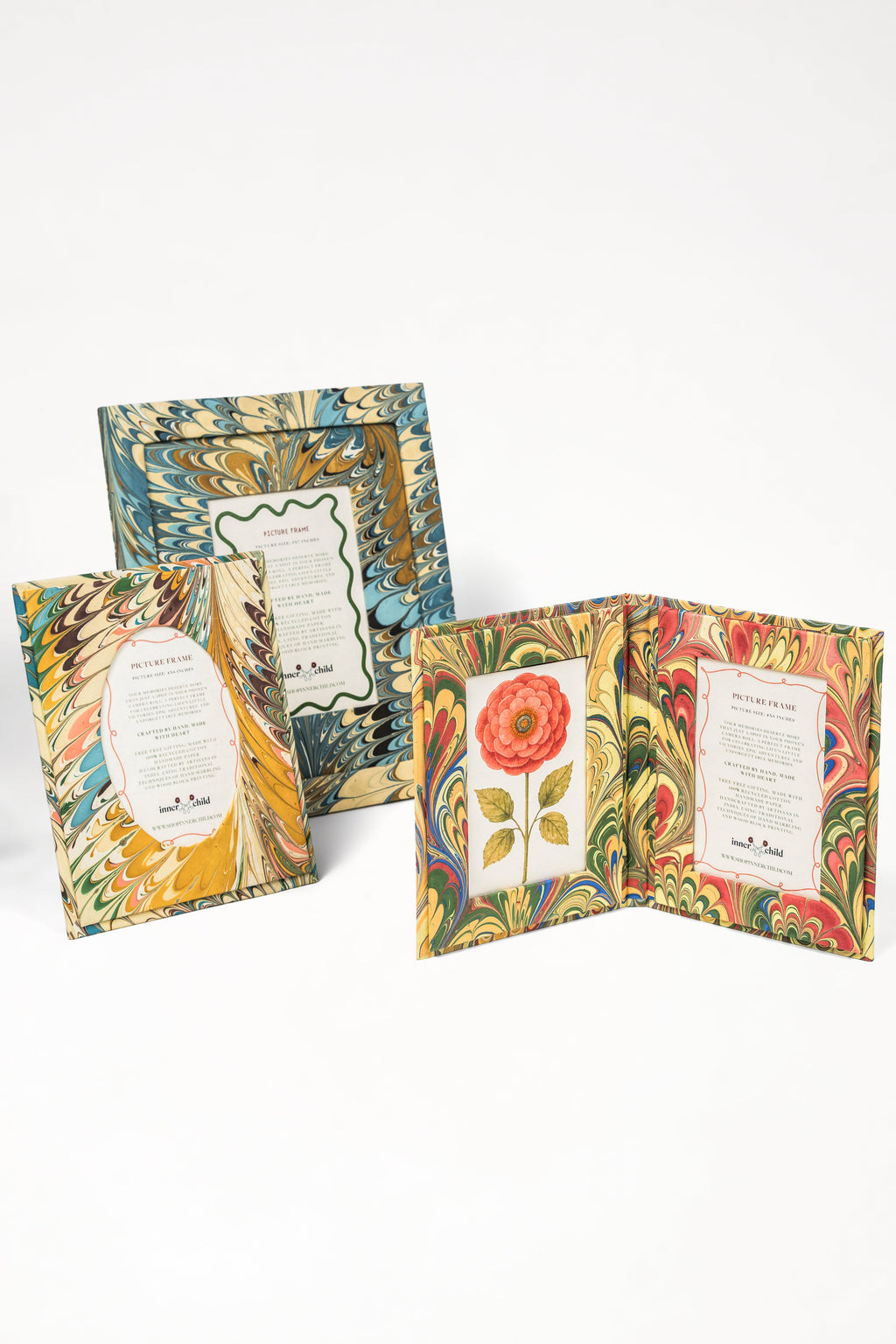 Collection of hand-marbled flatiron feathers picture frames with oval openings