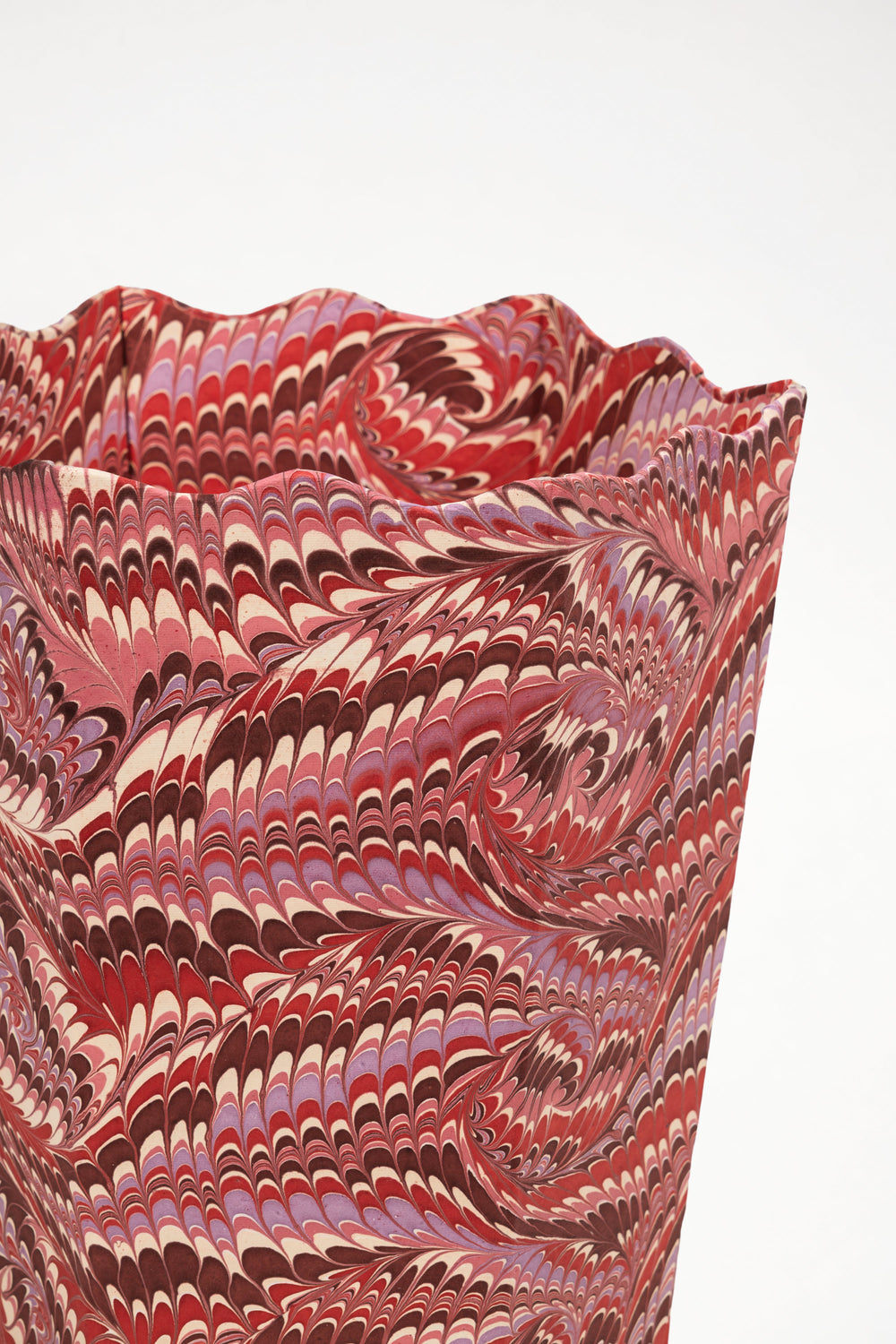 Close-up of hand-marbled tall basket with red-brown-purple swirls - Inner Child
