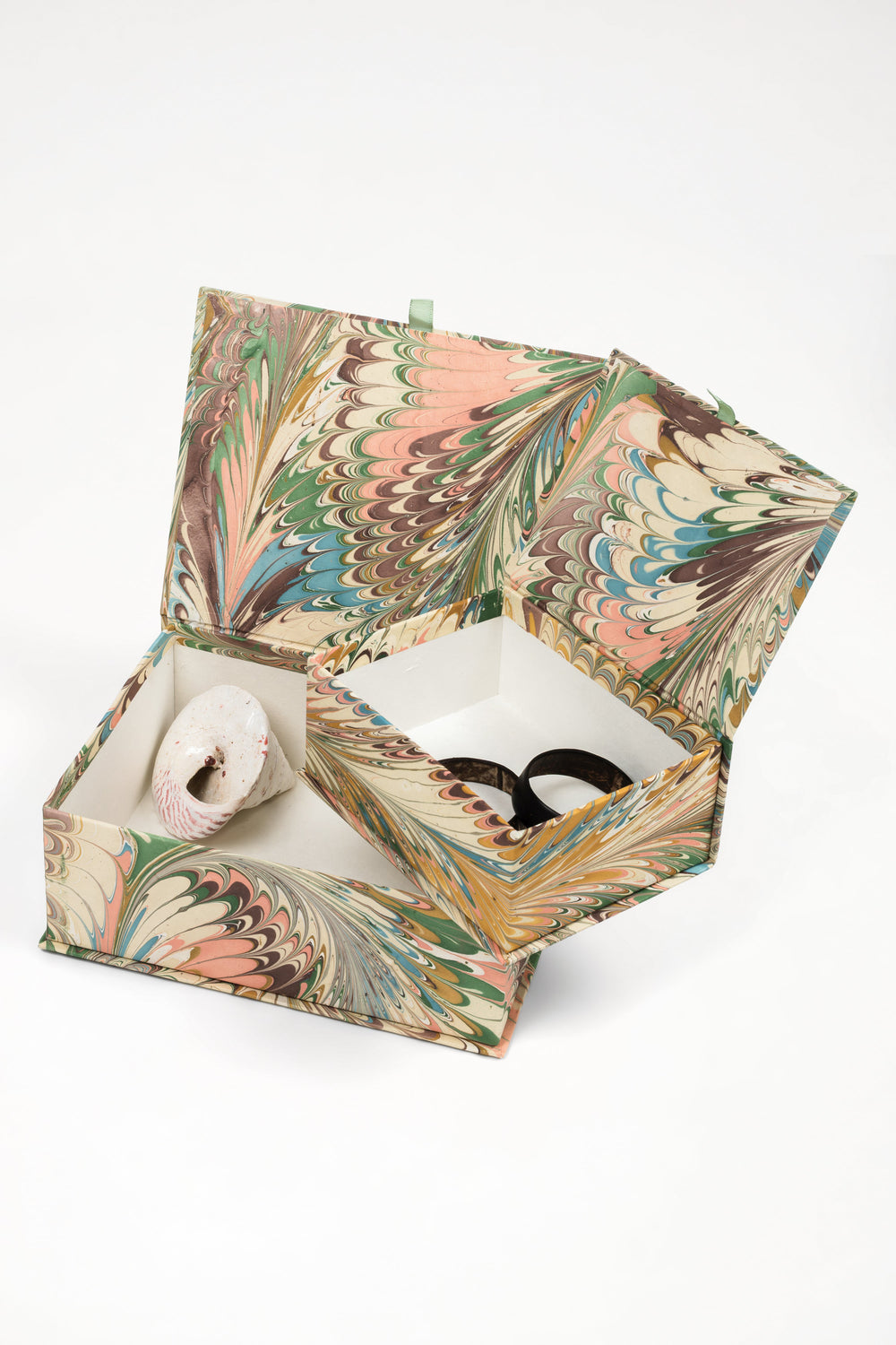 Inner Child hand-marbled keepsake box open with decorative shell