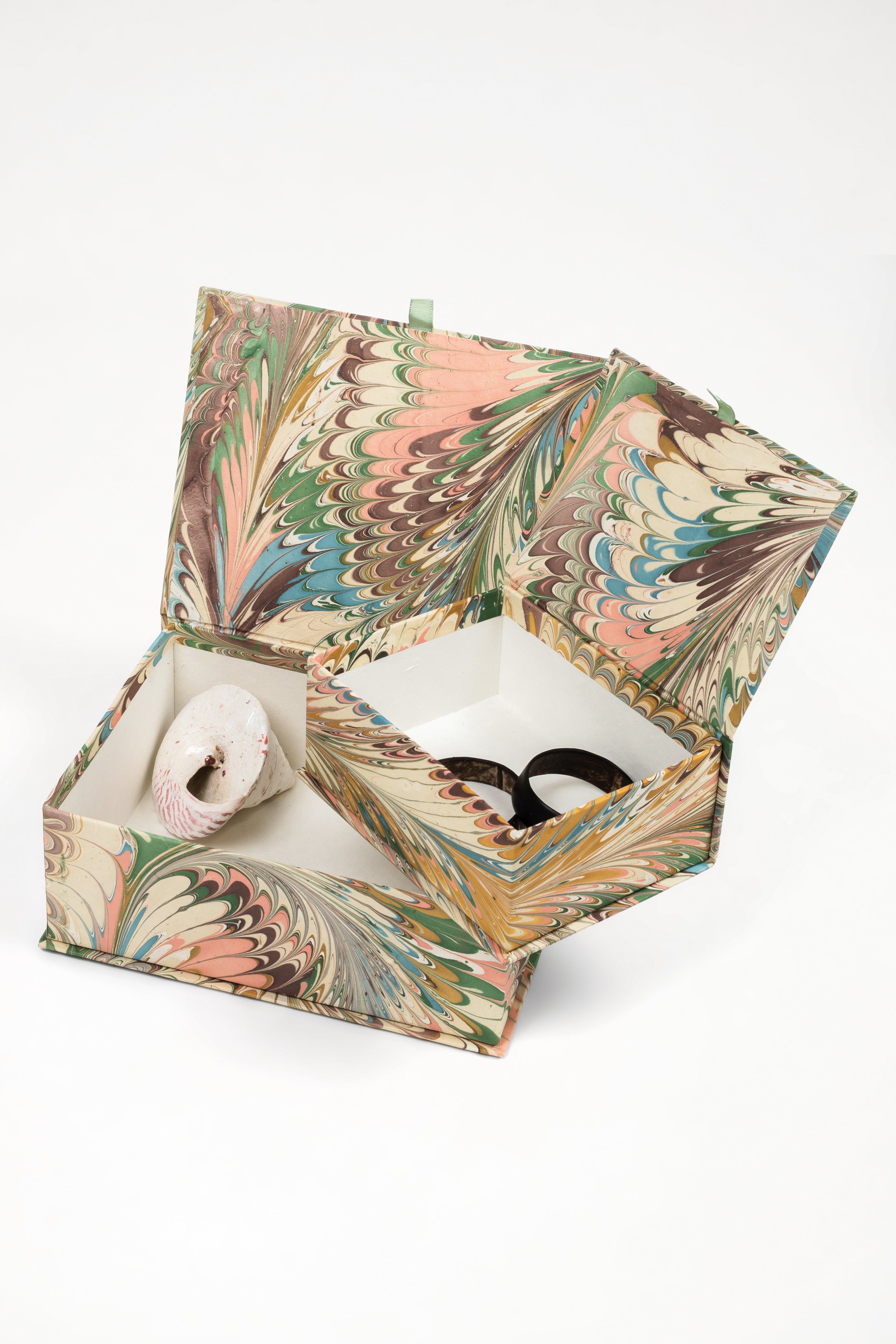 Inner Child hand-marbled keepsake box open with decorative shell