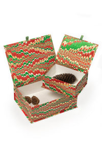 Inner Child hand-marbled keepsake box set in holiday jingle - open boxes containing pinecones