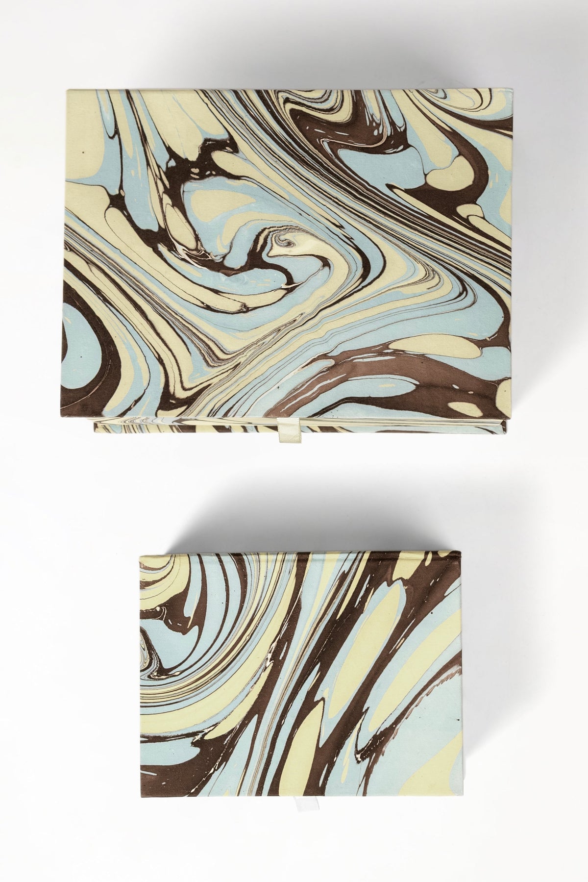 Hand-marbled Kyoto keepsake boxes with blue, brown, cream swirl patterns