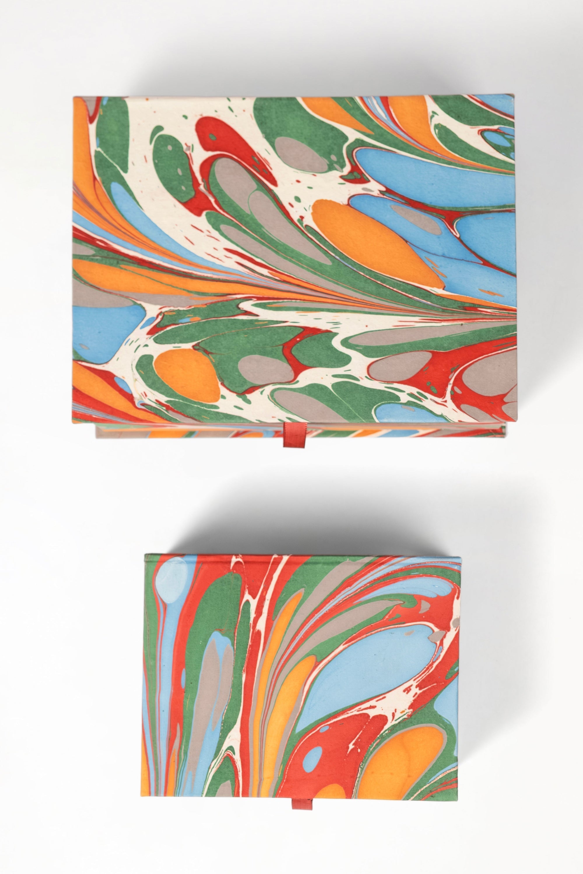 Inner Child hand-marbled keepsake box set in marais - two rectangular boxes displayed from top view with artistic marbling designs