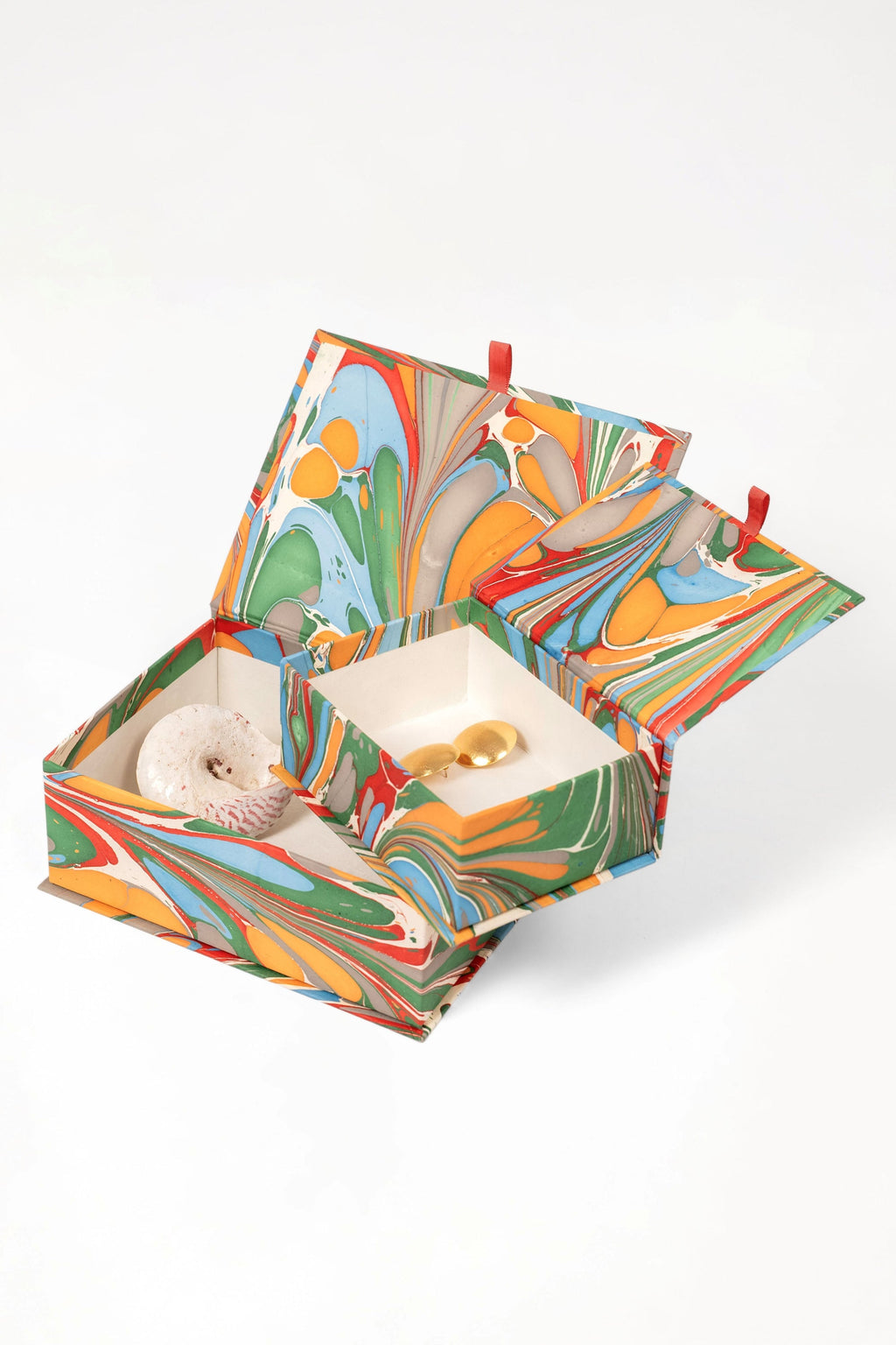 Vibrant multicolor hand-marbled keepsake box set with red ribbon closures