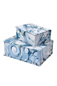 Blue ocean wave-patterned hand-marbled keepsake boxes stacked