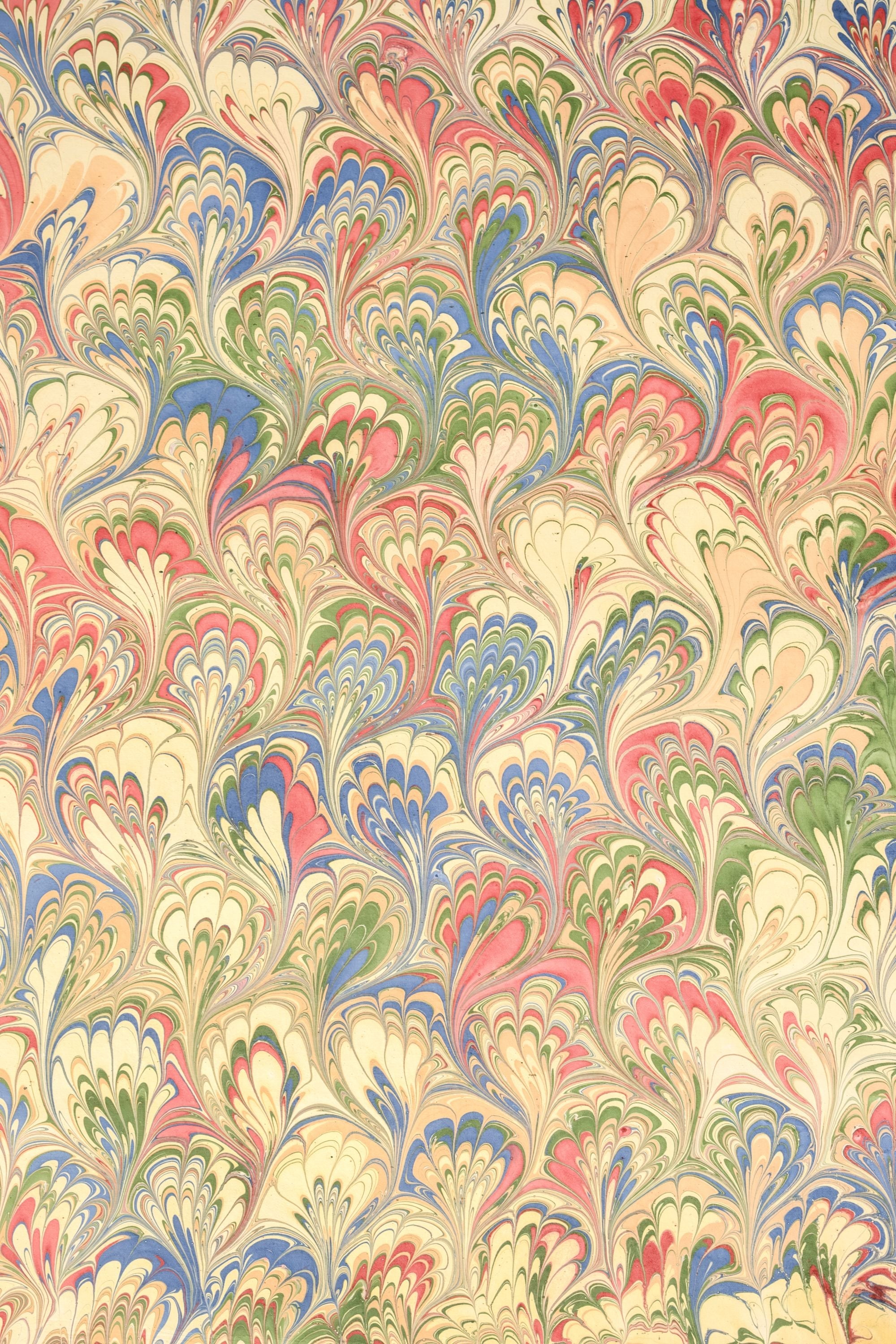 Inner Child multicolor hand-marbled gift wrap detailed pattern