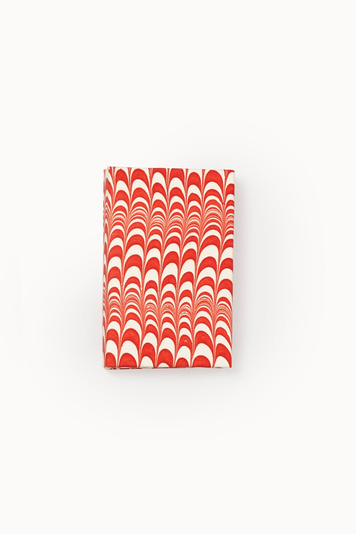 Single red and white swirled hand-marbled notecard from Inner Child