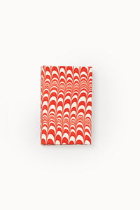 Single red and white swirled hand-marbled notecard from Inner Child
