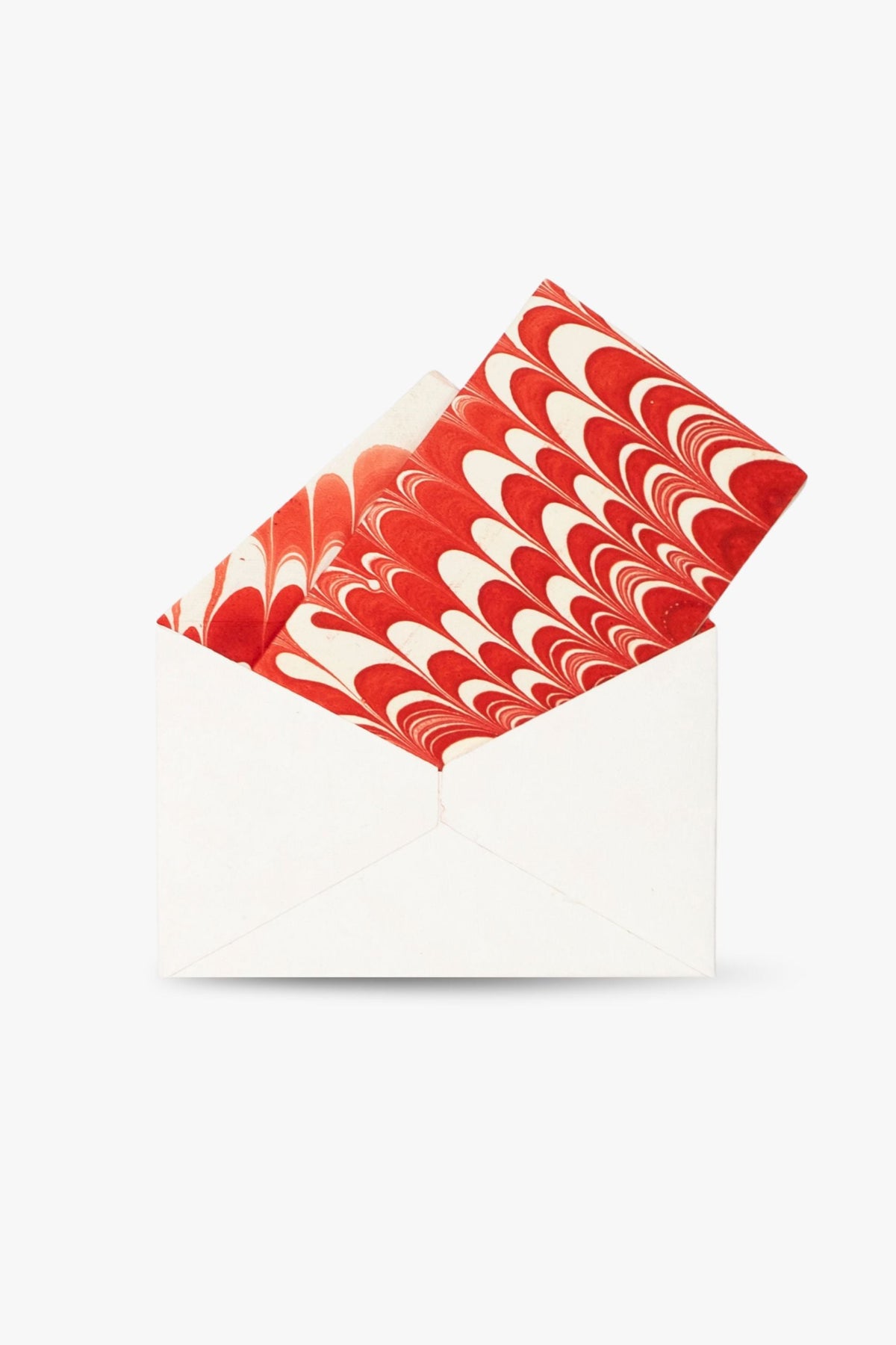 Red and white hand-marbled notecards in candy cane swirl inside white envelope