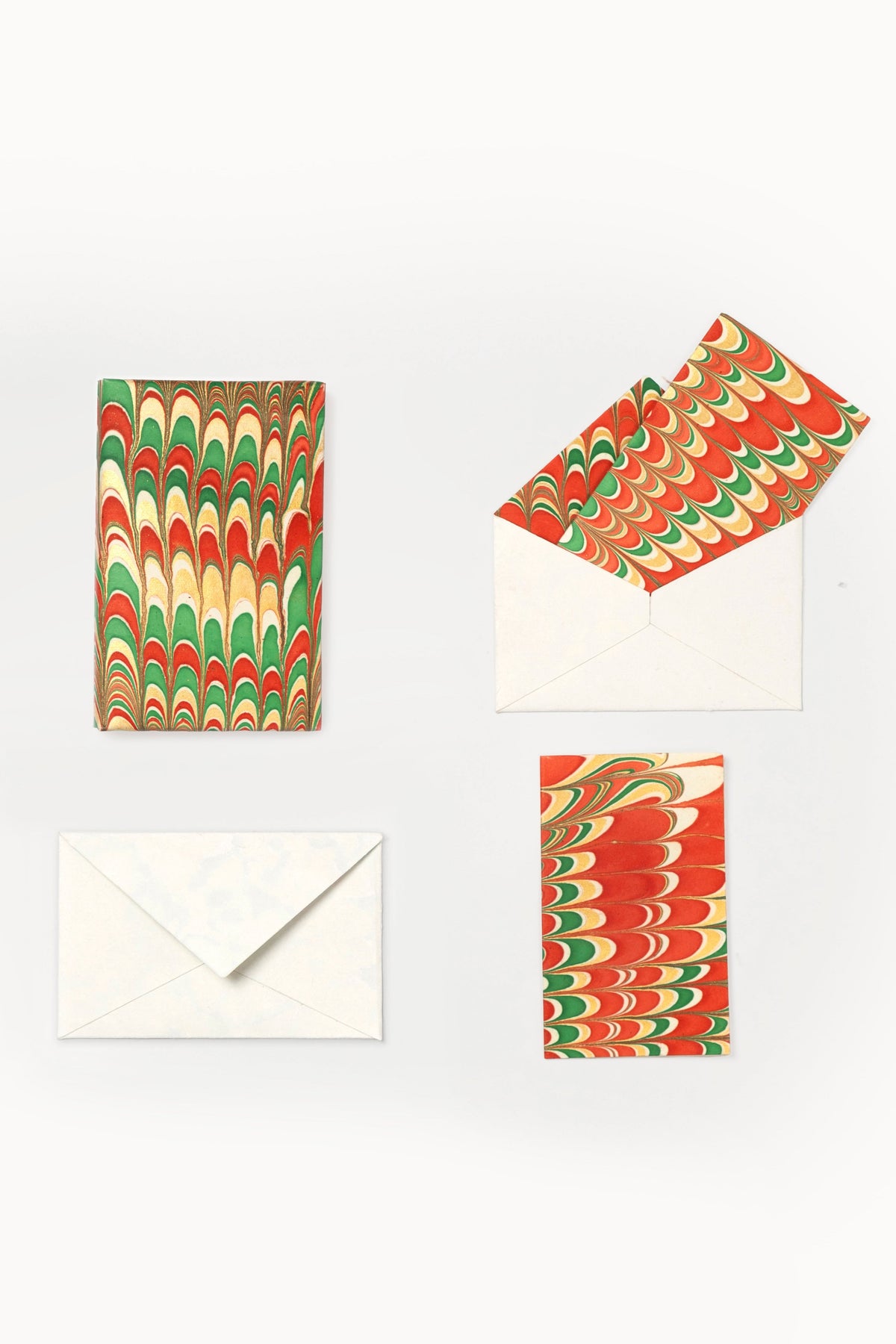 Set of 8 hand-marbled notecards with red green gold patterns, including envelope - Inner Child