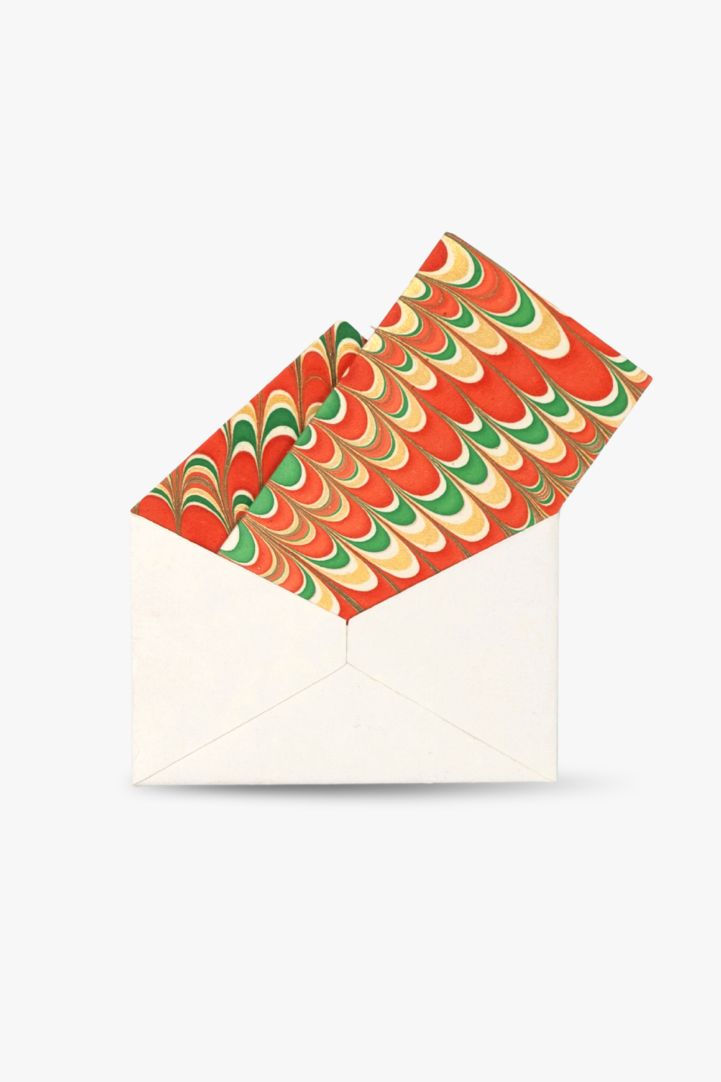White envelope holding hand-marbled notecard from Holiday Jingle collection