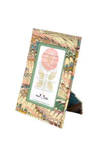 Inner Child's hand-marbled 4x6 picture frame with soft pink, blue, beige feather patterns