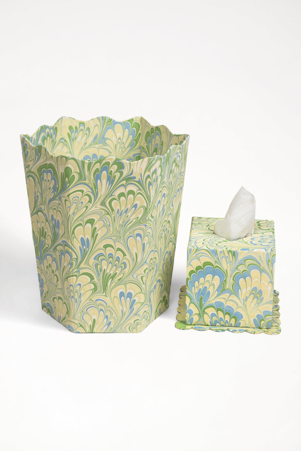 Matching hand-marbled scallop tissue containers set in seaglass peacock