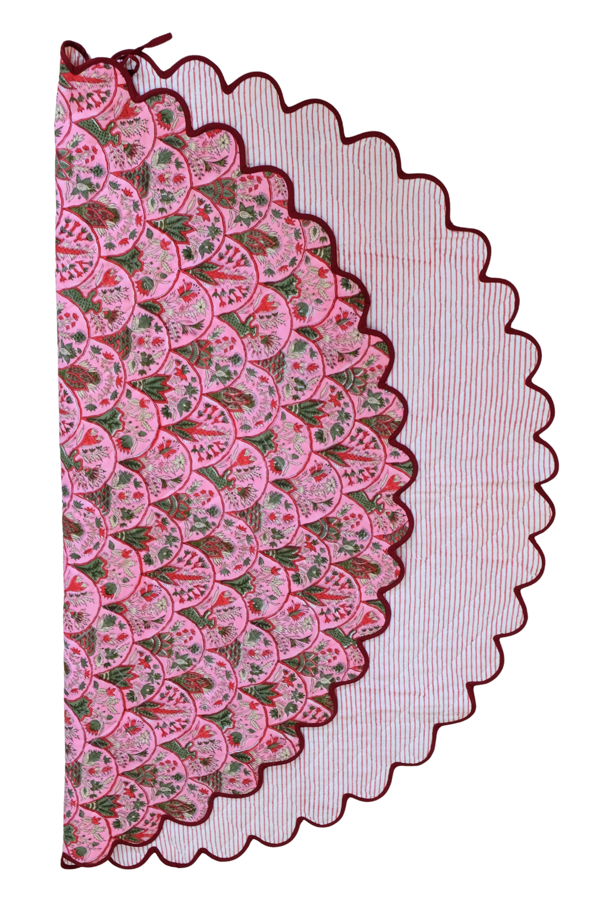 Reversible Holiday Arch Stripes scallop-edged tree skirt with pink floral front