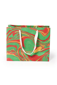 Inner Child medium hand-marbled holiday gift bag with white rope handles