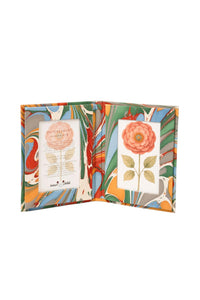 Opened hand-marbled folding picture frame with colorful patterns, flower insert - Inner Child