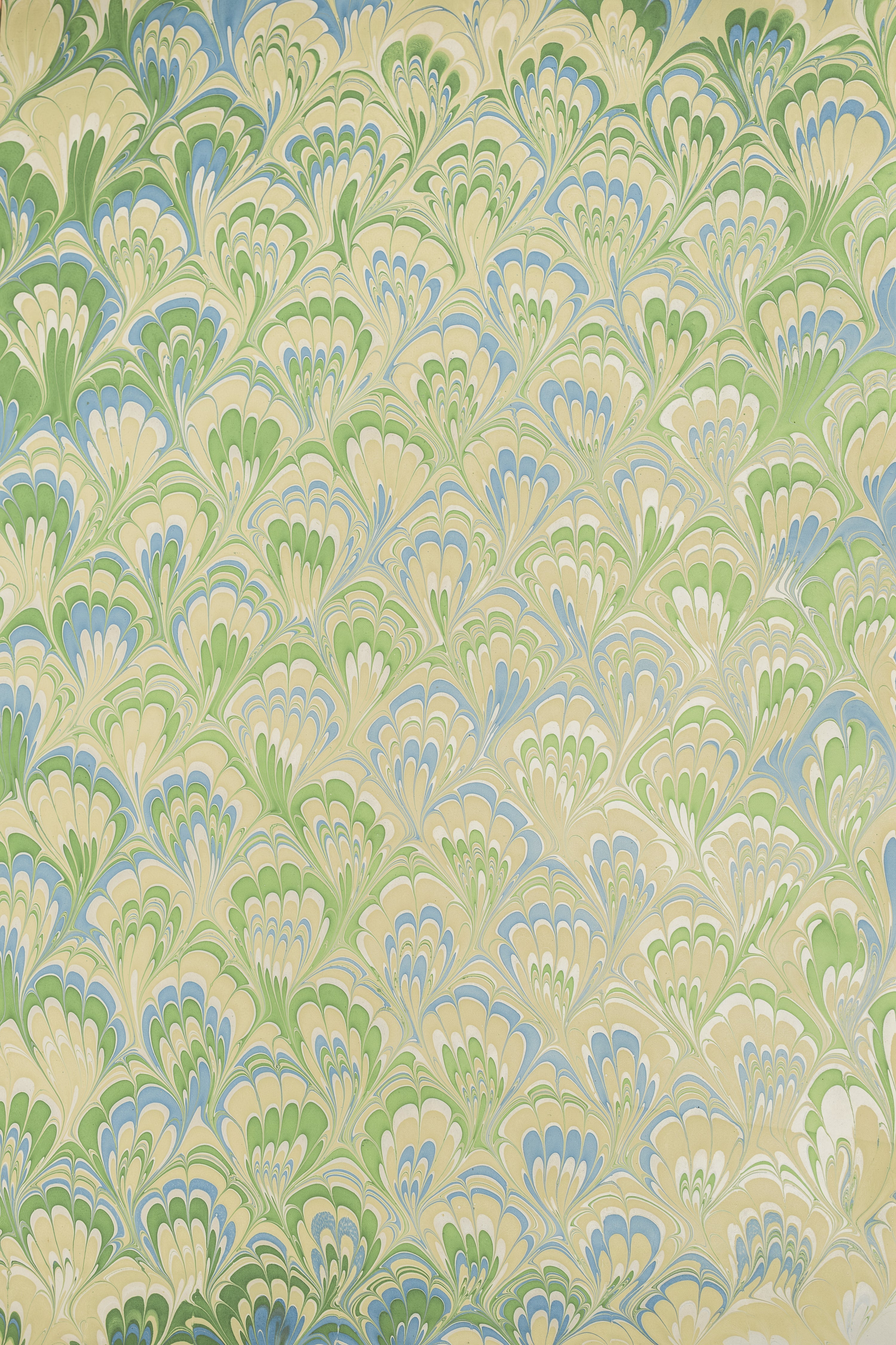Inner Child hand-marbled mini frame design showcasing repeating green/blue/cream patterns