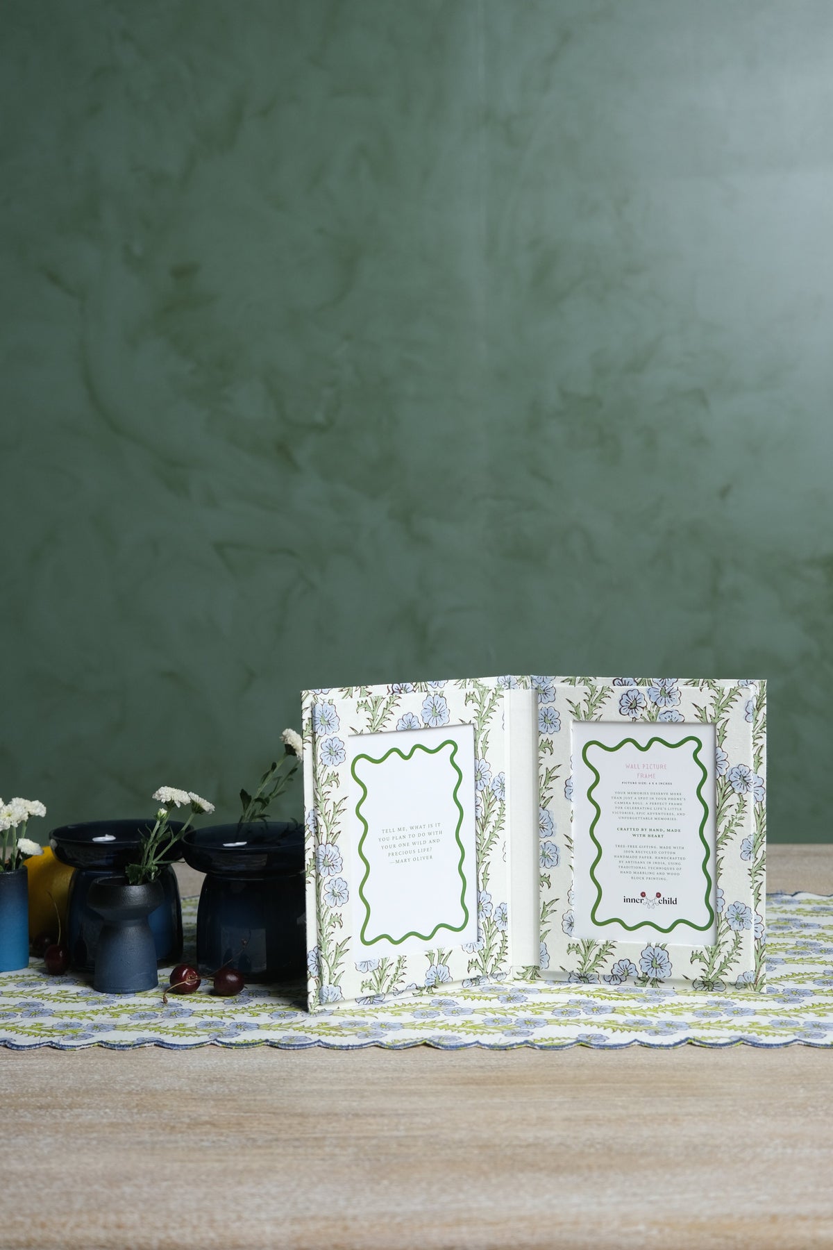 Forget-me-not blockprint folding picture frame book on decorative table setup from Inner Child