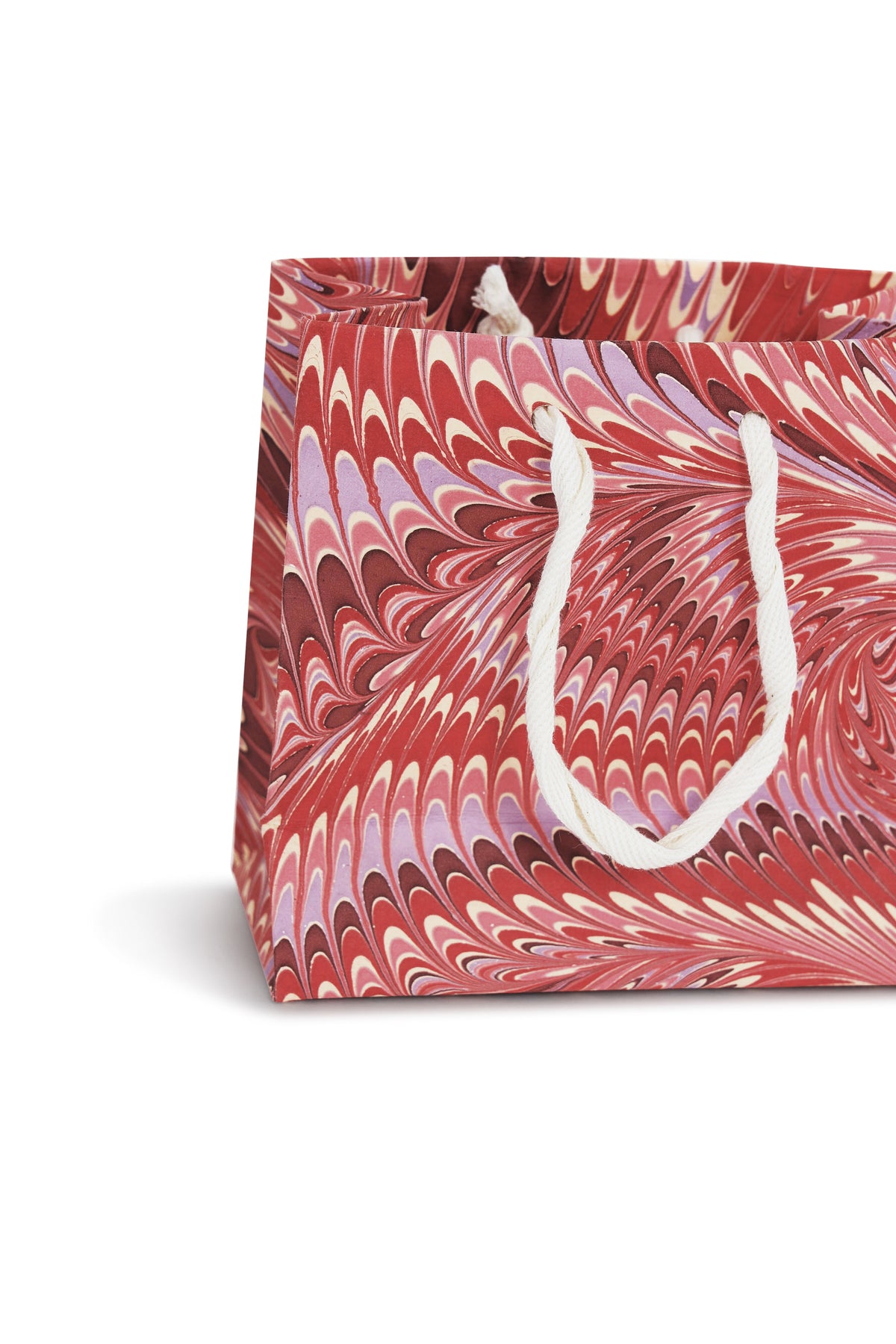 Close-up of medium Florentine pink hand marbled gift bag with white rope handle