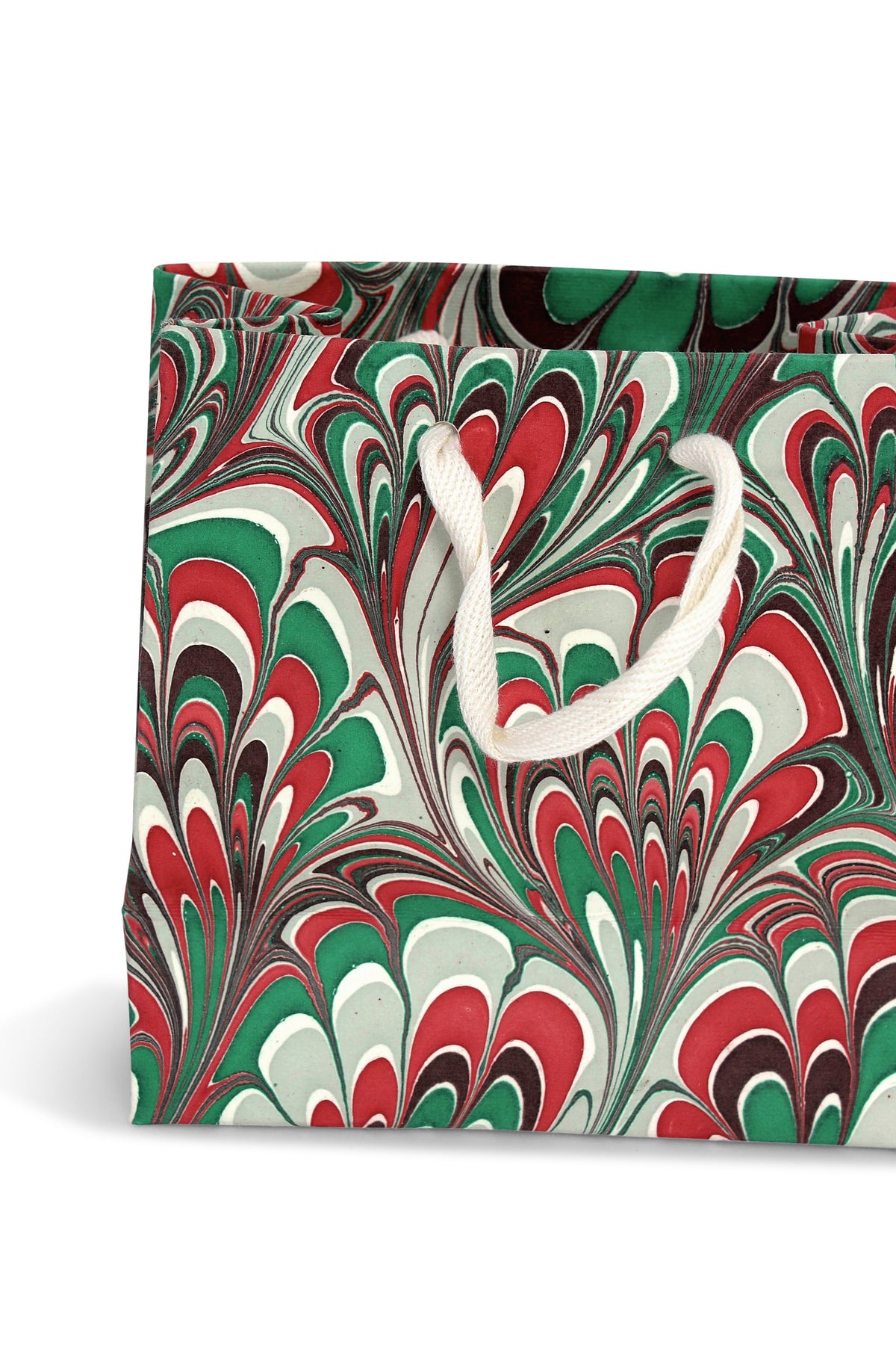 Holiday festive hand marbled gift bag with red, green, and gray swirl patterns, white rope handles