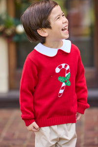 Little English traditional children's clothing. Red Intarsia Sweater with candy cane motif for boys and girls layered over red piped white knit peter pan shirt and khaki pebble twill banded pants.