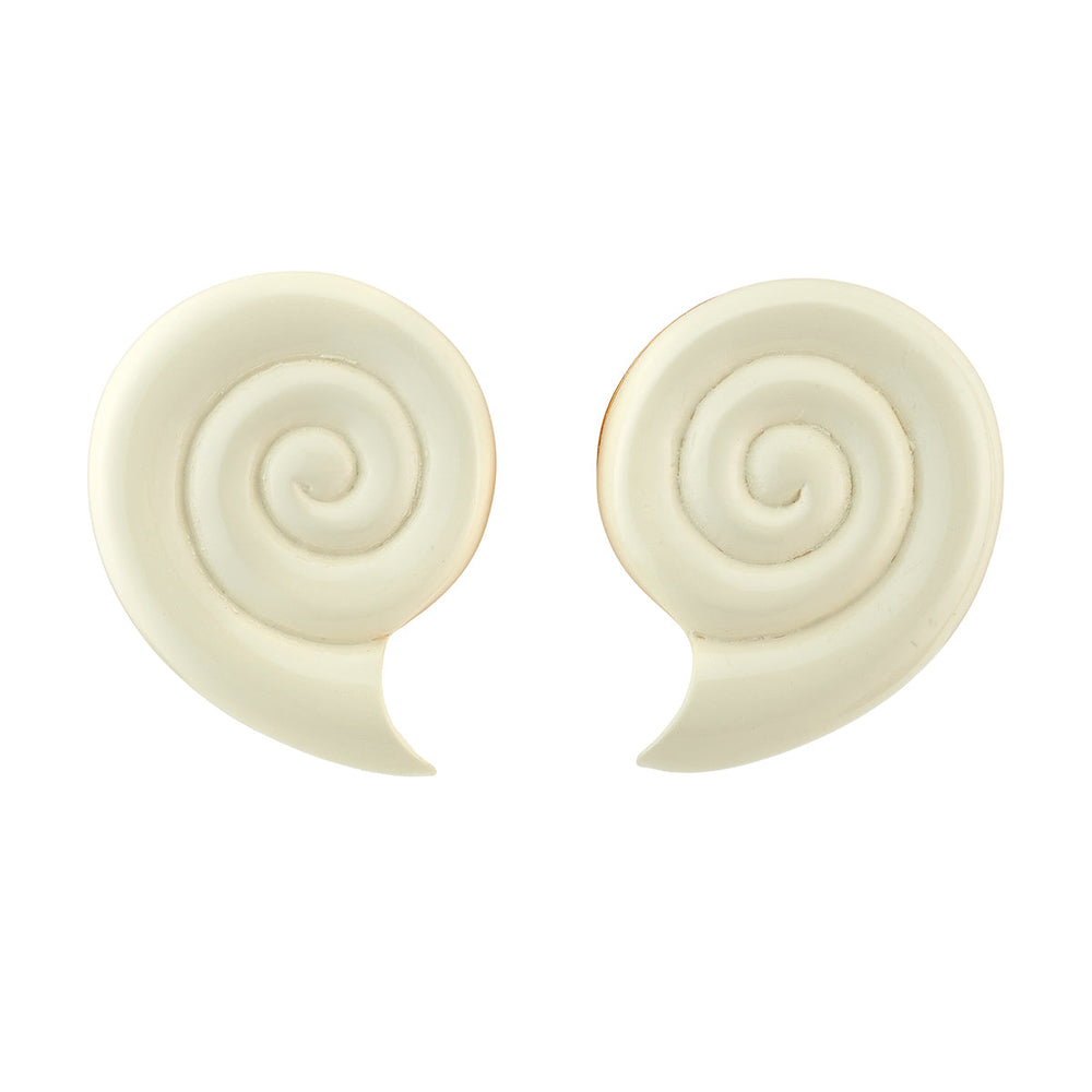 Front view of Isola Stud earrings showcasing ivory nautilus spiral resin design, clip-on style on white background
