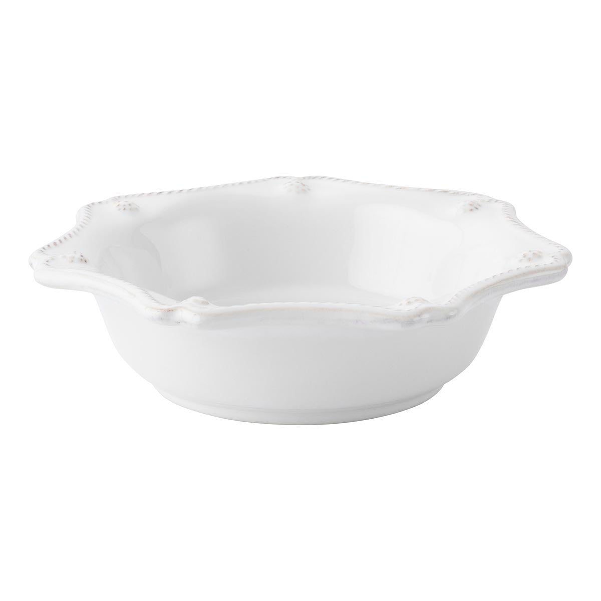 Angled view of Berry & Thread pie dish in whitewash showing scalloped rim and berry-and-thread trim on white background