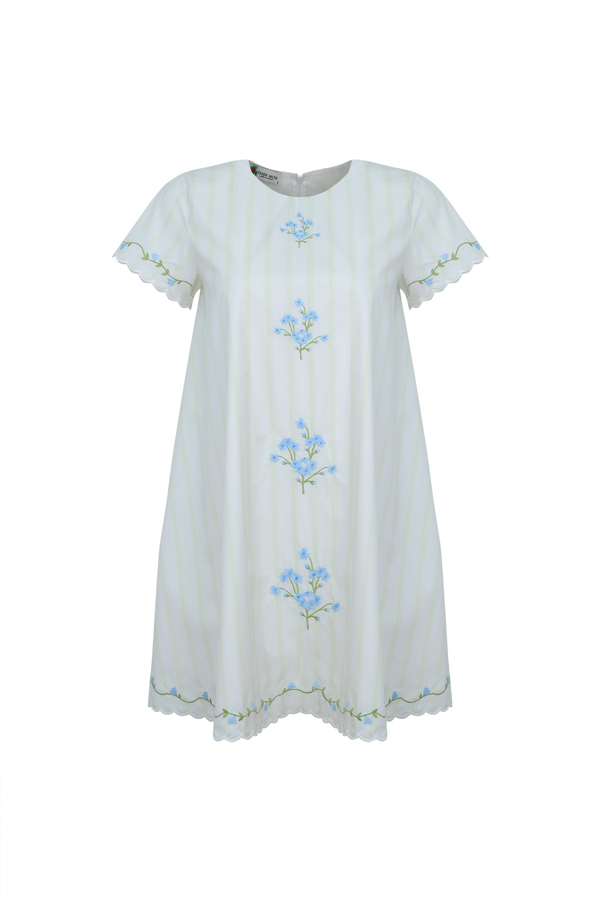 Front view of Jale Dress showcasing blue floral embroidery, pale green pinstripes, scalloped sleeves and scalloped hem on white background