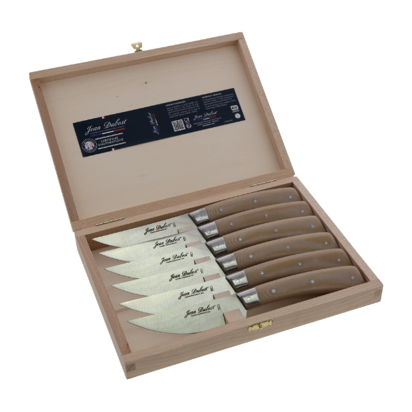Open view of Bistronomie steak knives set showcasing six ivory micarta handles and stainless steel blades in a wooden presentation box