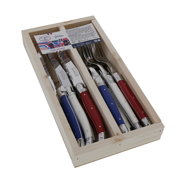 Angled view of Everyday Flatware Set in Paris Colors showcasing six knives and six forks in a wooden box