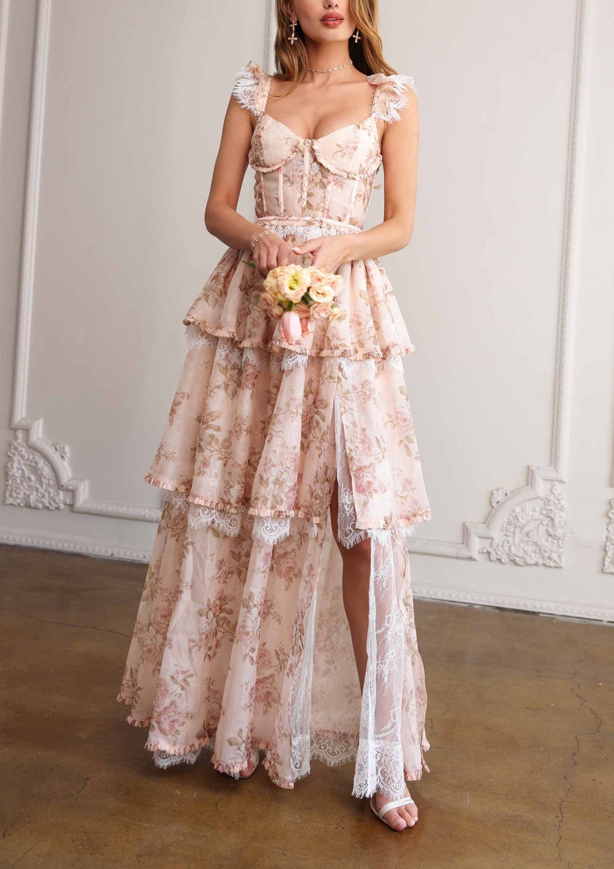 Front view of The Jolie Dress in Peach Tapestry showcasing floral print, corset bodice, ruffle straps, and lace trim indoors