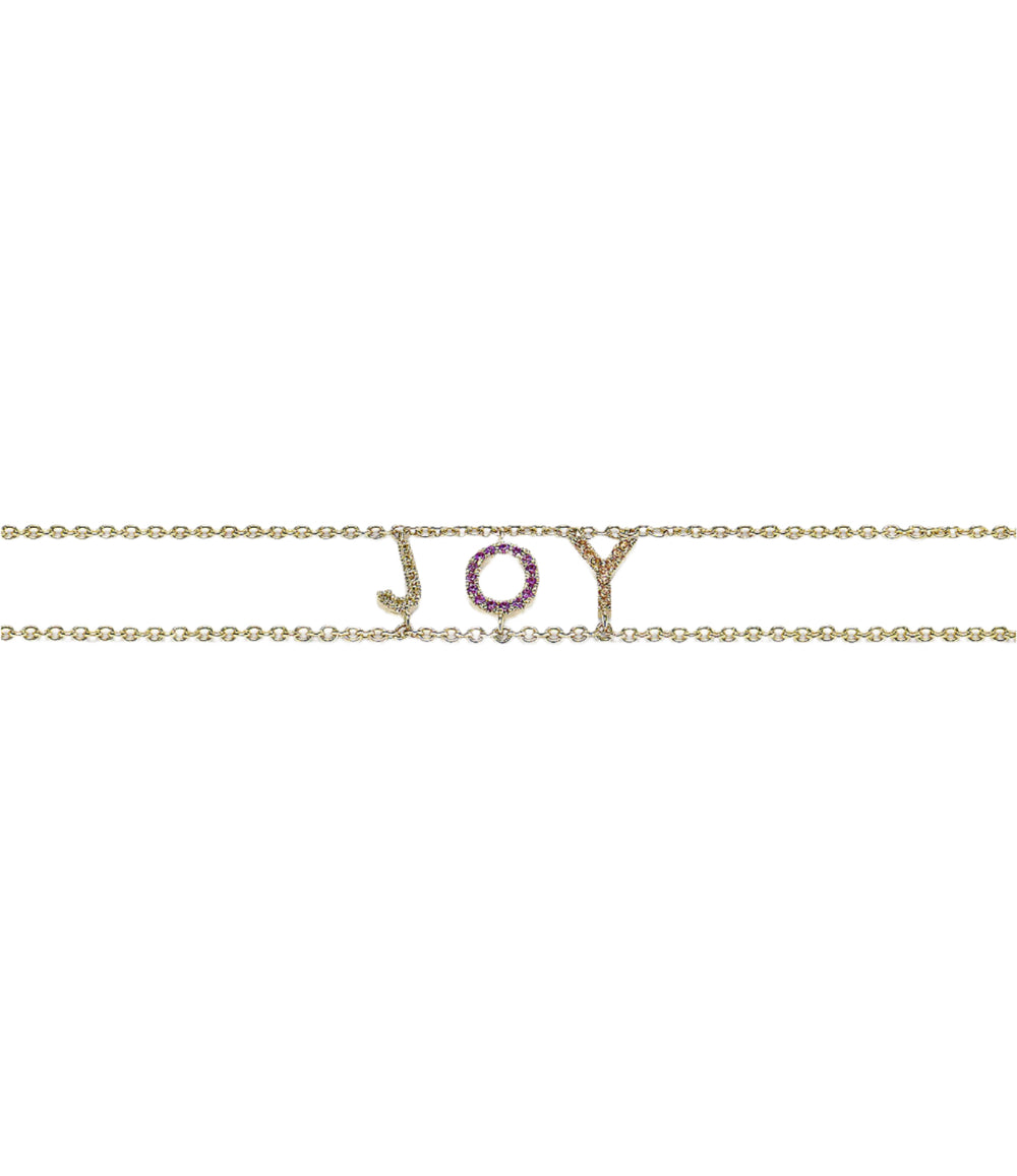 Front view of double gold Joy say-something bracelet showcasing letter charms set with pink and yellow sapphires