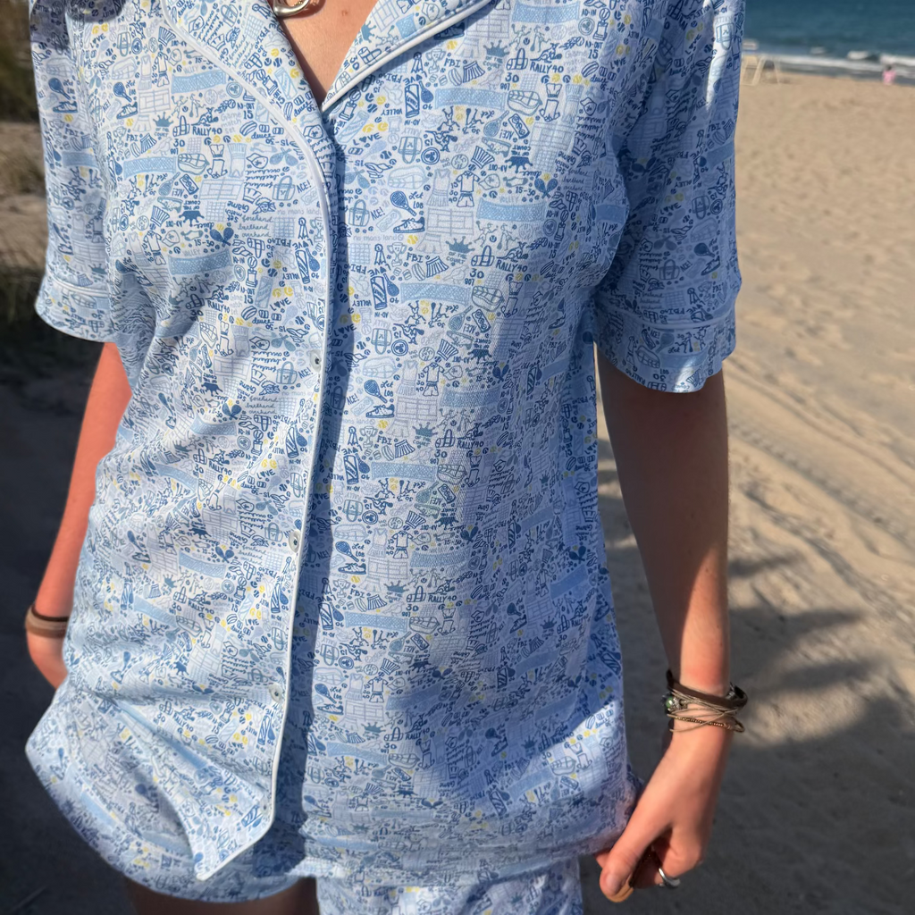 Front view of Tennis Women’s Button Front Short Pajama Set showcasing hand-drawn tennis print by the beach