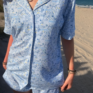 Front view of Tennis Women’s Button Front Short Pajama Set showcasing hand-drawn tennis print by the beach