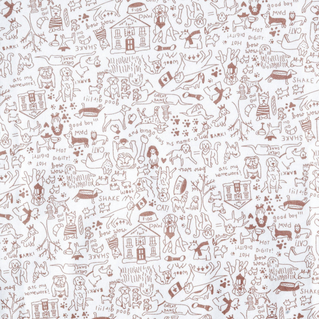 Close-up of the Good Dog Zip Baby Onesie showcasing its ivory ground and brown hand-drawn dog print